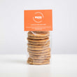 Load image into Gallery viewer, Packaged Ginger Welsh Cakes with an orange MamGu Welshcakes label on a white background