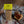 Load image into Gallery viewer, Packaged Cheese and Leek Welsh Cakes with a jar of chutney on kitchen table cloth and cooling rack.
