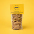 Load image into Gallery viewer, Mini Egg Welsh Cakes in a pack with a yellow label and yellow background
