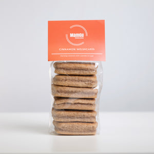 Packaged cinnamon Welsh cakes with an MamGu Welshcakes label on a white background