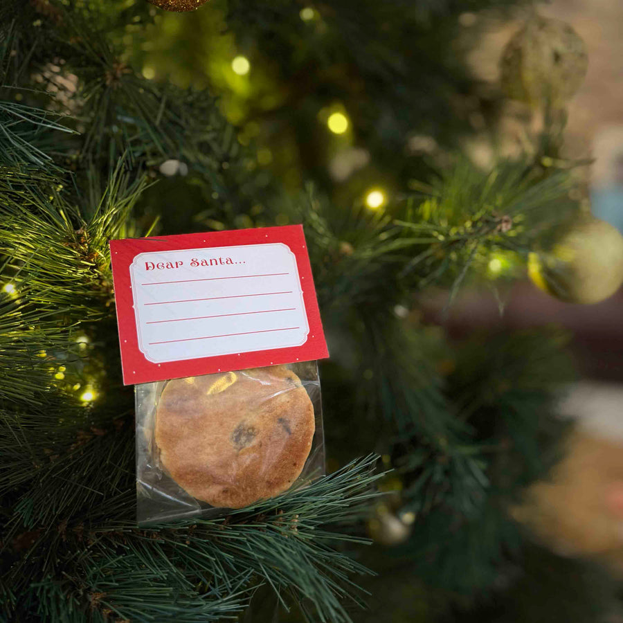 2 pack of traditional welsh cakes with a space for children to write a note or draw a picture for Santa. Displayed on a Christmas tree