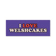 Load image into Gallery viewer, A rectangular purple bumper sticker with the text 'I LOVE WELSHCAKES' in red and white lettering, shown on a plain white background.

