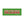 A rectangular green sticker or sign with the phrase “MADE IN THE LAND OF DRAGONS” in large red letters outlined in white.