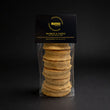 Load image into Gallery viewer, 6 marmite welsh cakes in clear packaging with a black mamgu welshcakes label on top and a complete black background.
