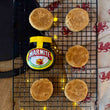 Load image into Gallery viewer, marmite jar with 5 welsh cakes on a black cooling rack
