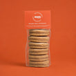 Load image into Gallery viewer, 6 pumpkin spice welsh cakes with an orange studio background
