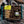 Load image into Gallery viewer, Packaged Vegan Cheese &amp; Leek Welsh Cakes with a jar of chutney in a gift box displayed on a messy kitchen work top with rolling pin, griddle and welsh dragon table cloth.
