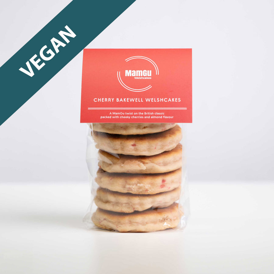 Packaged vegan cherry bakewell Welsh cakes with a mamgu welshcakes label on a white background