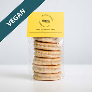 Packaged vegan lemon Welsh cakes with a yellow mamgu welshcakes label on a white background