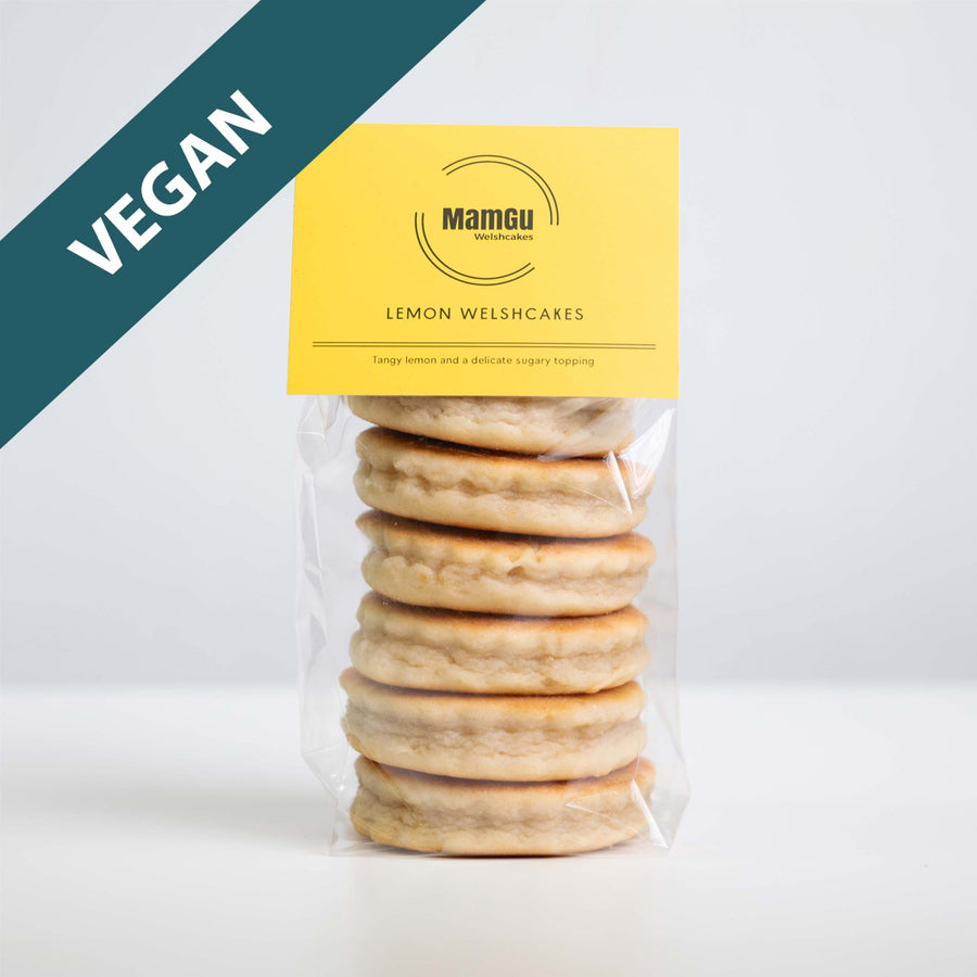 Packaged vegan lemon Welsh cakes with a yellow mamgu welshcakes label on a white background