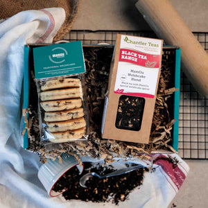 Tea packaged with Traditional Welsh Cakes in a gift box on a busy kitchen worktop