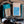 Load image into Gallery viewer, Packaged Traditional Welsh Cakes and ground coffee with branding on a busy kitchen table with rolling pin, cooling rack and coffee beans
